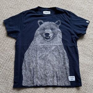 Urban Outfitters | 100% Cotton Supremebeing Mont Bear Tee in Navy Blue | Size M